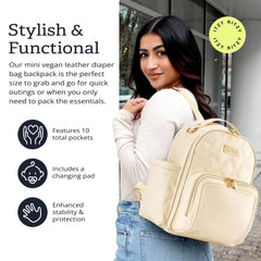 Itzy Ritzy Mini Plus Backpack parent pocket with key lanyard for essentials access.