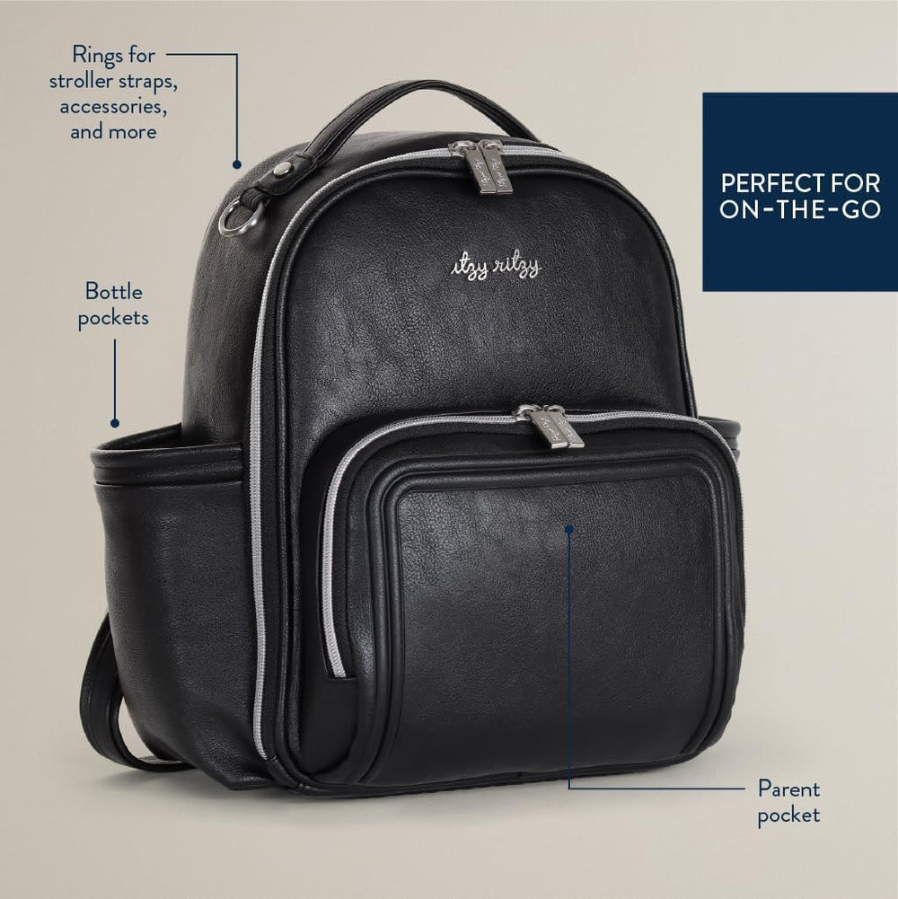 Itzy Ritzy mini plus grab-top handle enables quick single-handed access