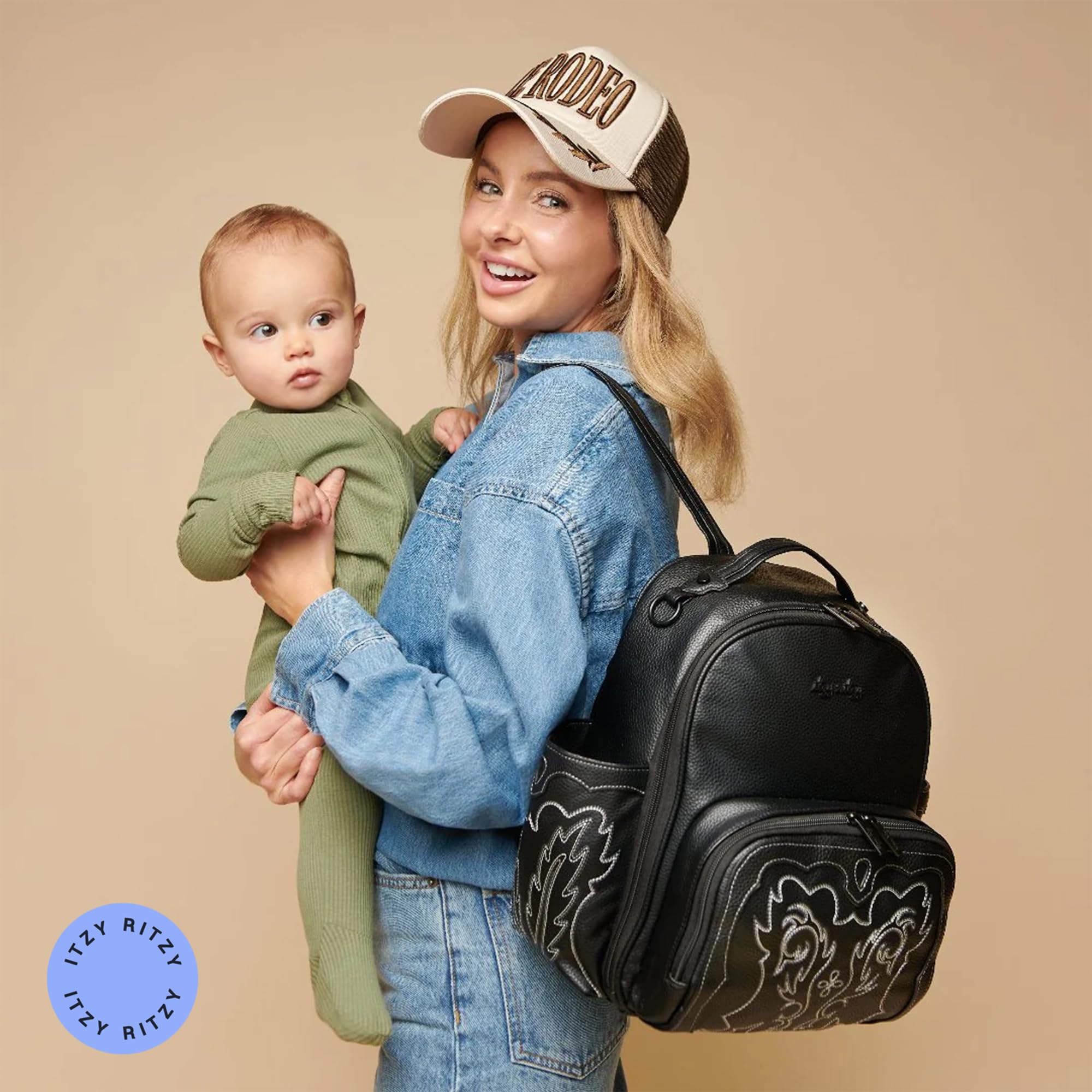 Itzy Ritzy Mini Plus Outlaw adjustable straps offer hands-free comfort