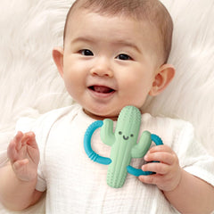 Itzy Ritzy silicone teether with textured surfaces for gum massage and exploration.