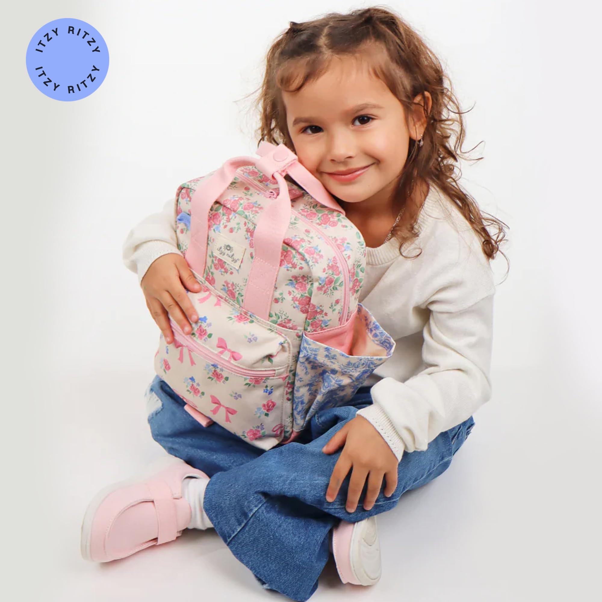 Rear view of Itzy Ritzy toddler backpack highlighting compact, kid-friendly size.