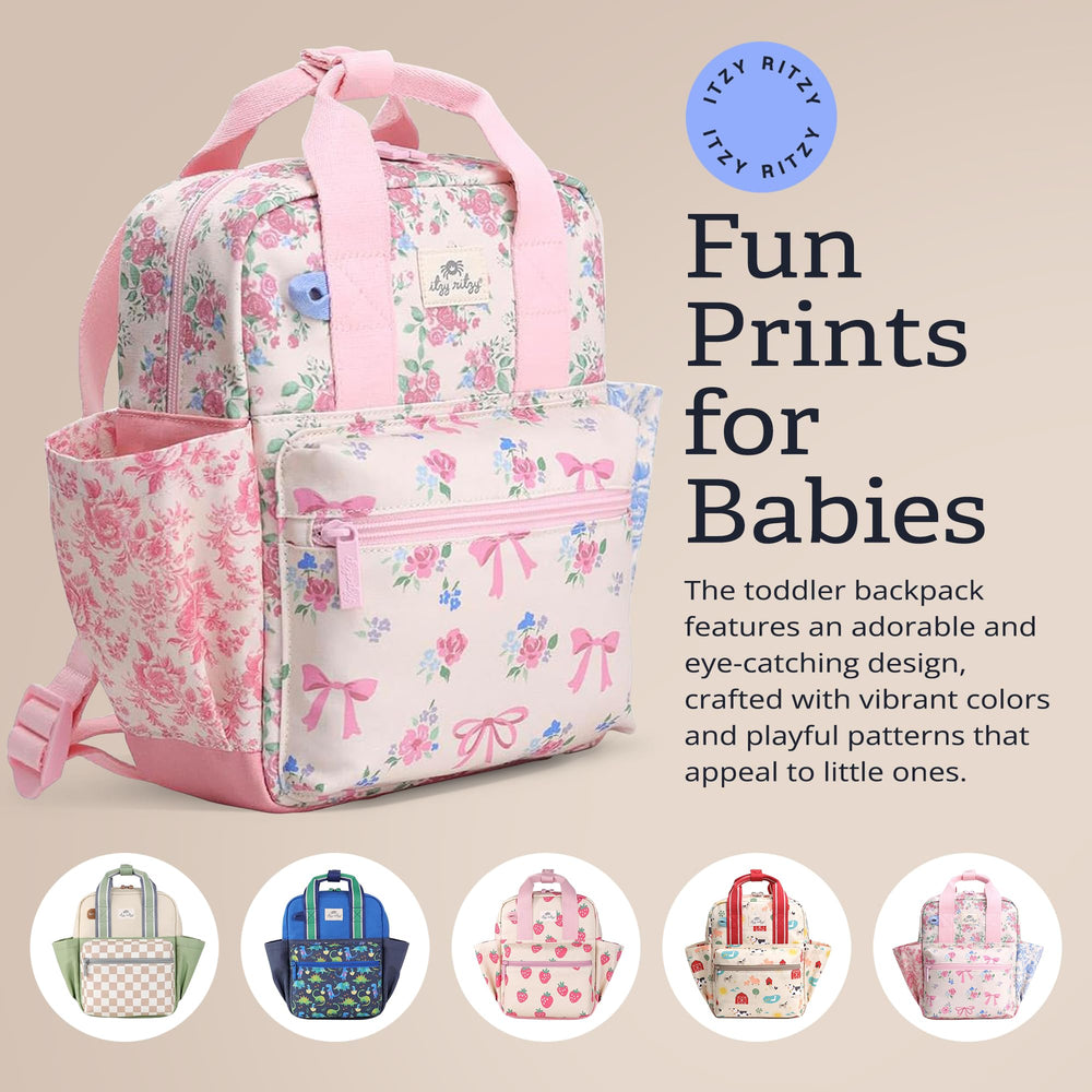 Top snap handles on Itzy Ritzy toddler backpack for easy grab-and-go.