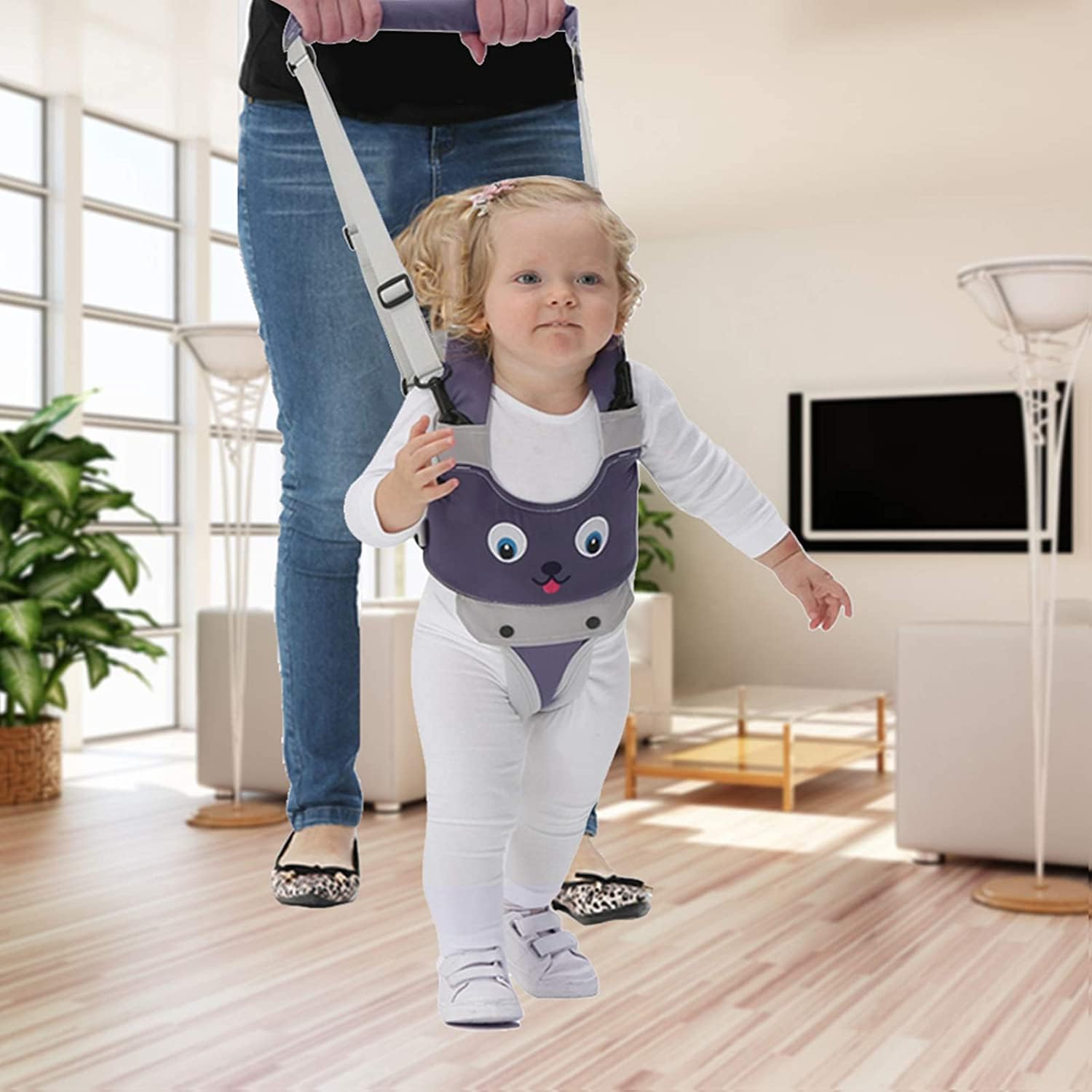 IULONEE Baby Walker Harness grey in action with child and parent nearby.