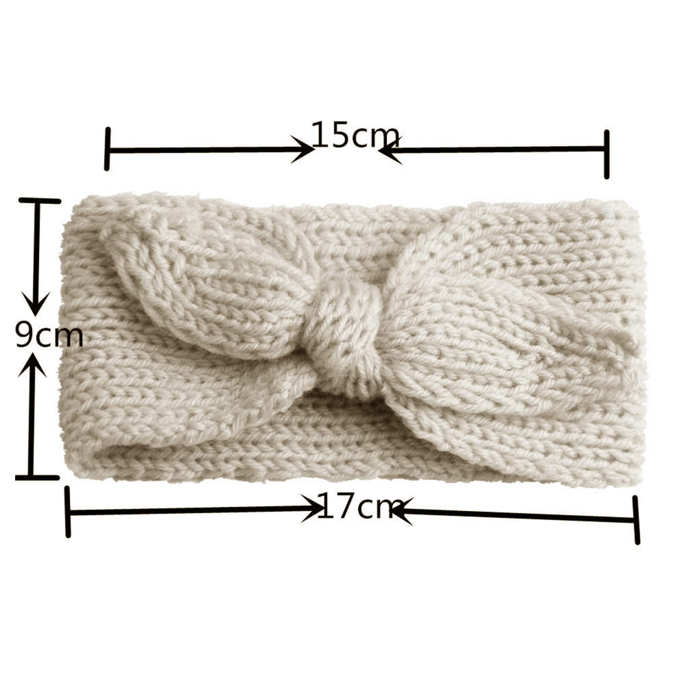 IZUS knitted headwrap newborn soft texture close-up highlights skin-friendly fabric.