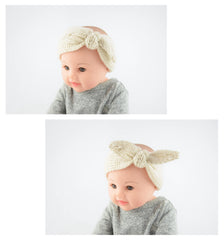 IZUS stretchy headband adjustable for newborns to 7-year-olds.