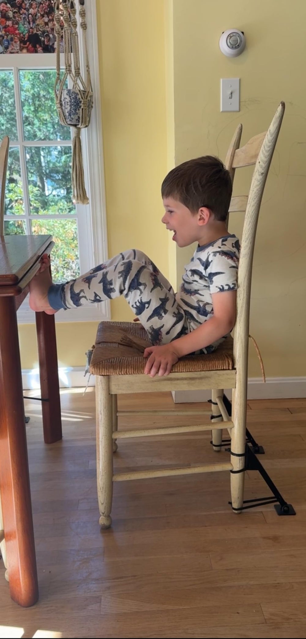 Jackaroo Leg Classic helps stabilize chairs when toddlers kick the table