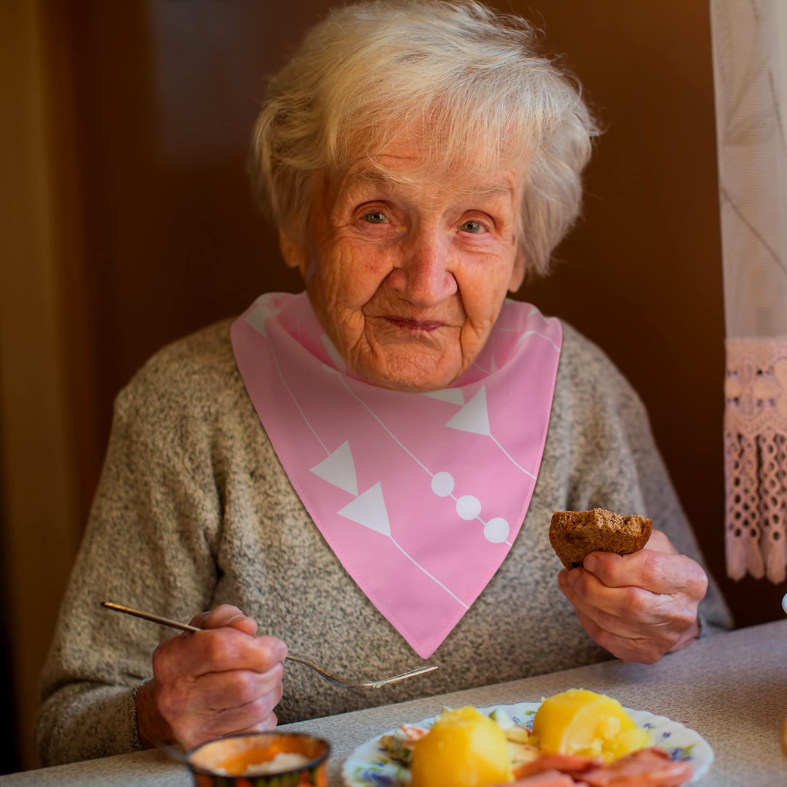 Janmercy keeps clothes clean during meals, crafts, and everyday activities.