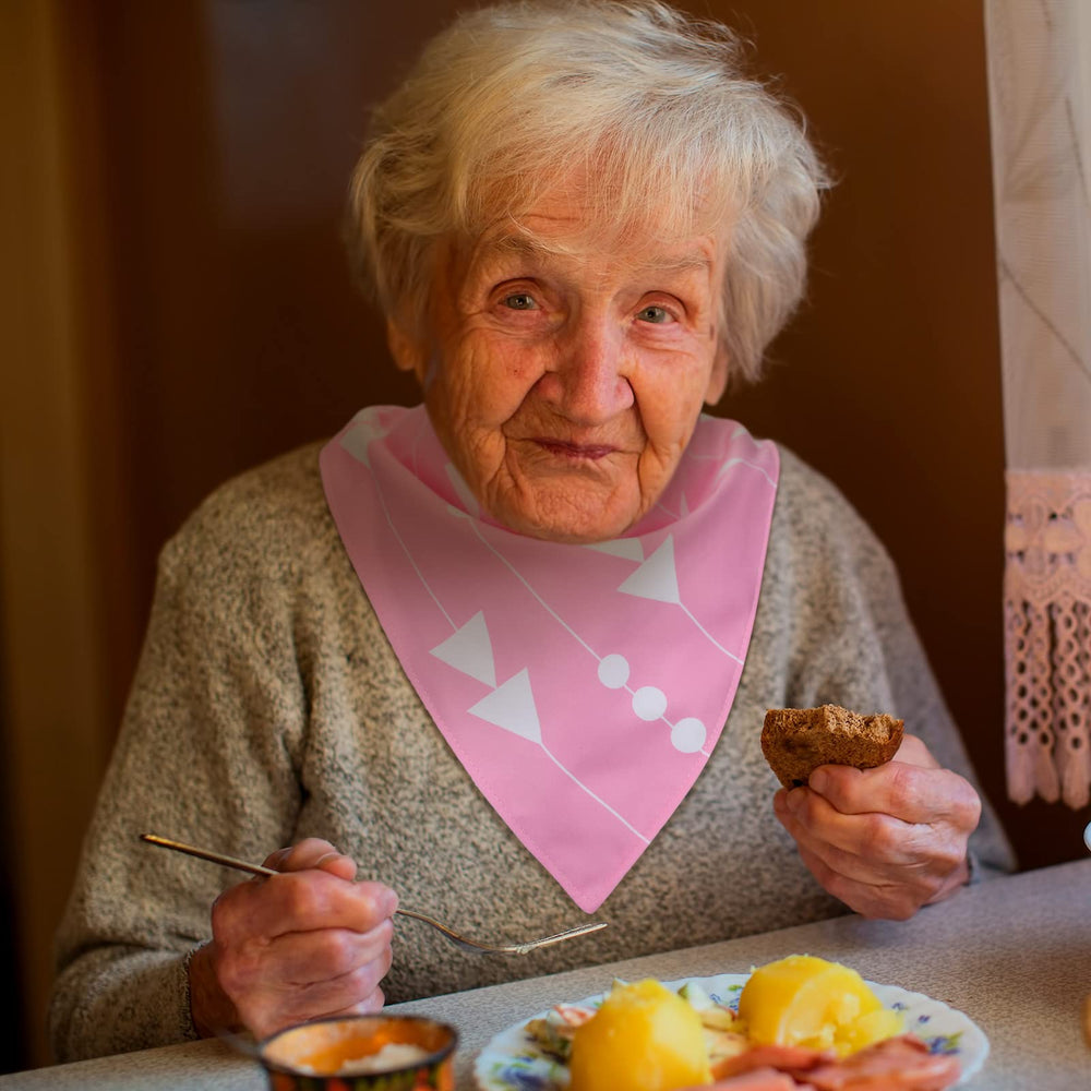 Janmercy keeps clothes clean during meals, crafts, and everyday activities.