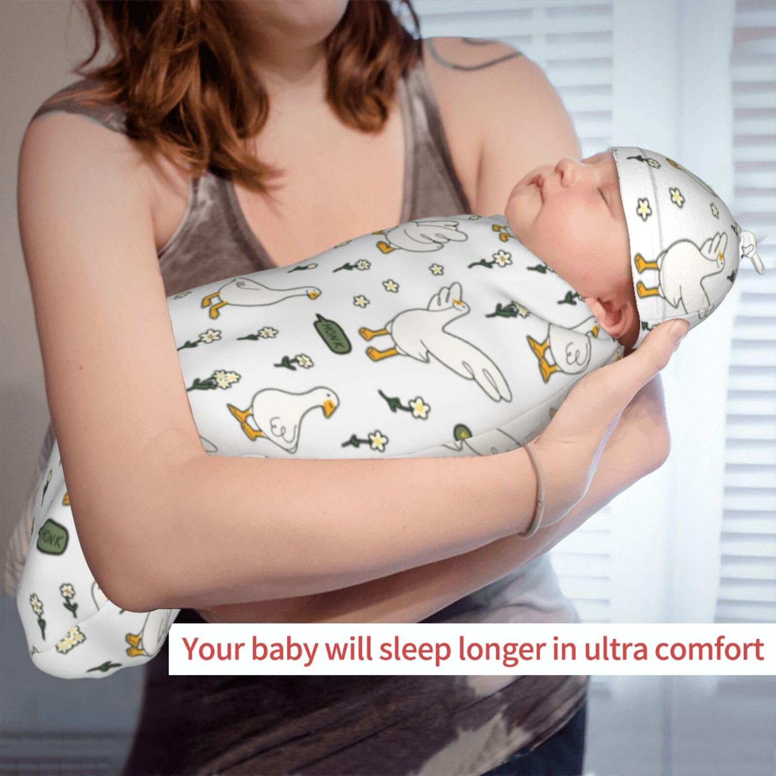 Jarverce Goose Swaddle Blanket on baby shows secure, comfortable sleep-ready wrap.