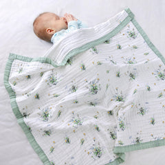 Jay & Ava Soft Cotton Muslin Blanket in use with toddler during nap or travel