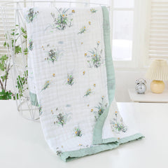 Jay & Ava Soft Cotton Muslin Blanket in stroller or car seat for outings
