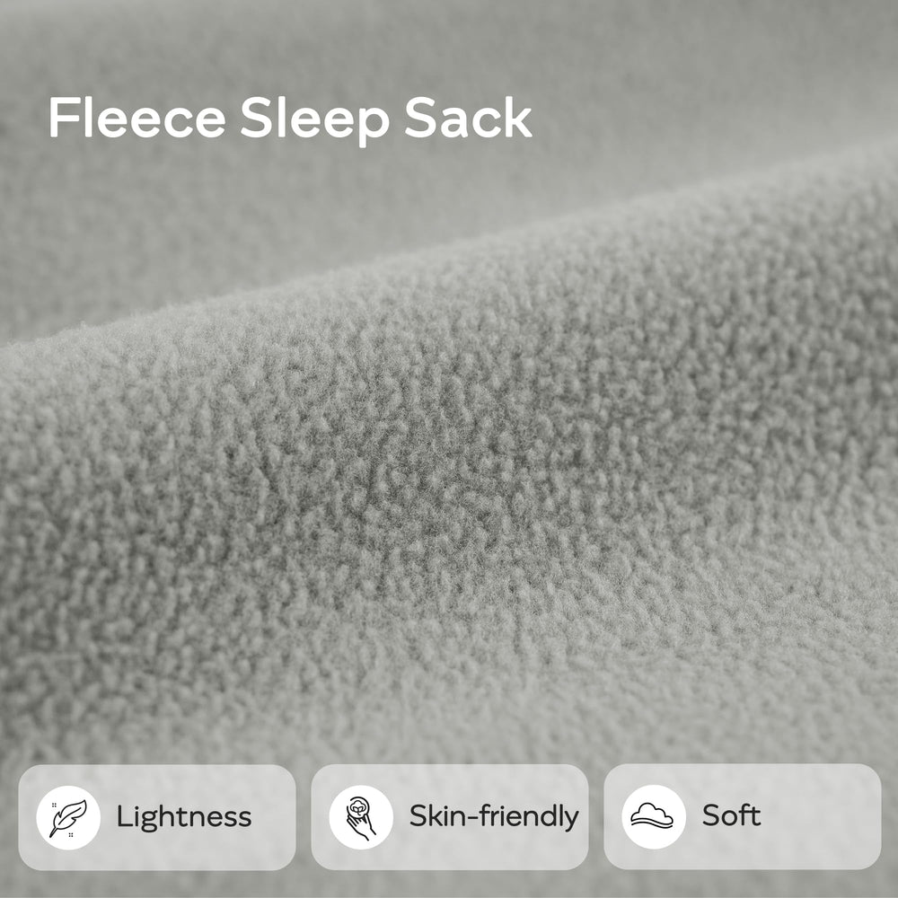 Sleep sack in crib demonstrates safe, snug wear for baby’s night routine.