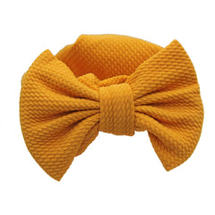 Jerague bow-knot cap on toddlers adds cute styling and comfort.