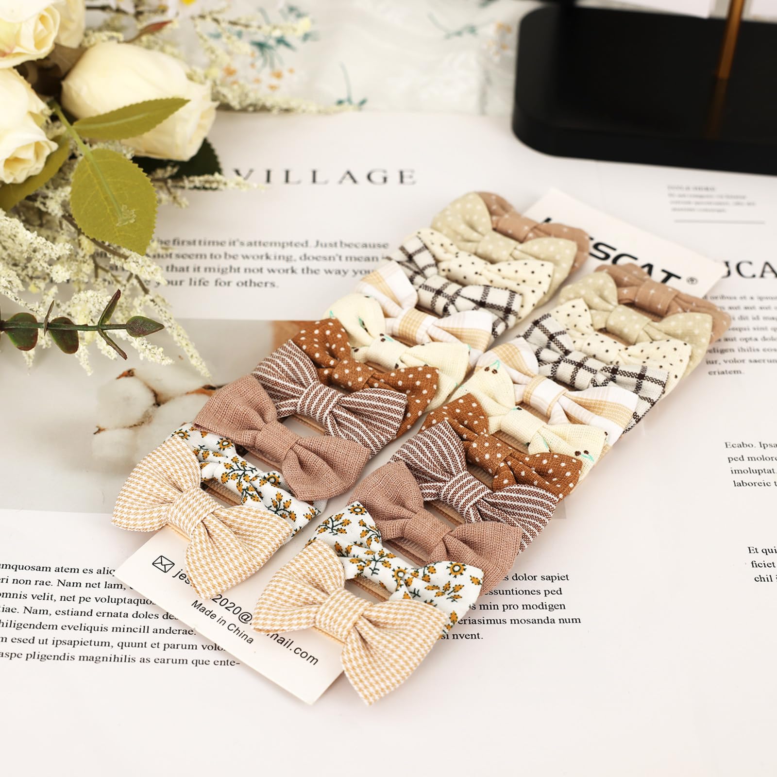 JESSCAT mini bow measures 1.8x1.2 inches with 1.4-inch clip