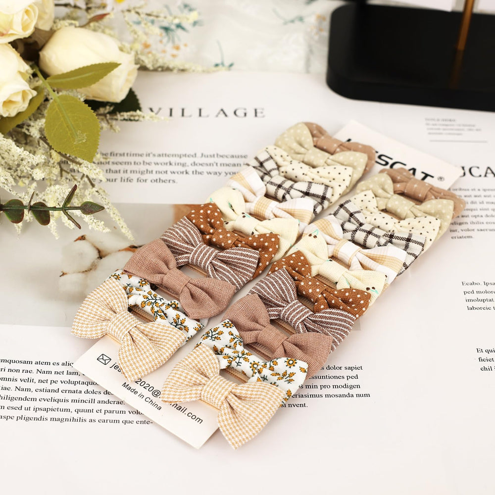 JESSCAT mini bow measures 1.8x1.2 inches with 1.4-inch clip