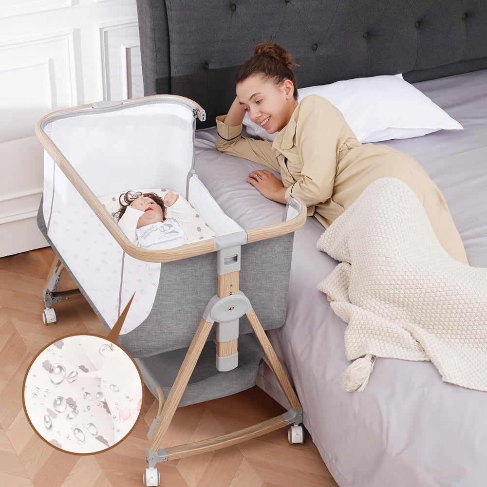 Jestonten baby bassinet bedside sleeper with wood frame for easy night-time care.