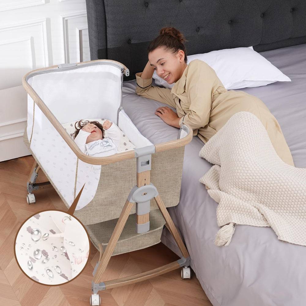 Jestonten baby bassinet with mattress and waterproof sheet for easy, clean newborn sleep.