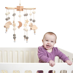 JETM·HH Felt Ball Nursery Decor enhances sensory appeal in a calm crib setting