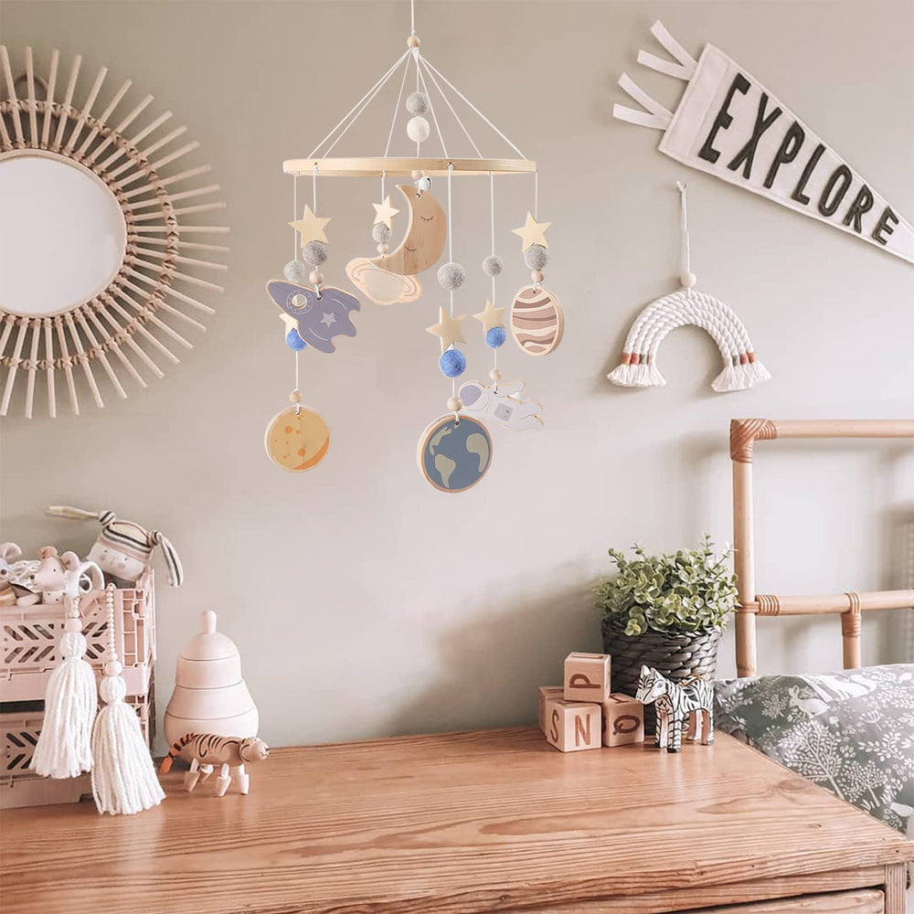 JETM·HH Space Nursery Mobile universe design creates dreamy nursery vibes.
