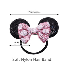 JIAHANG pink sequin bow with polka dots adds charming detail.