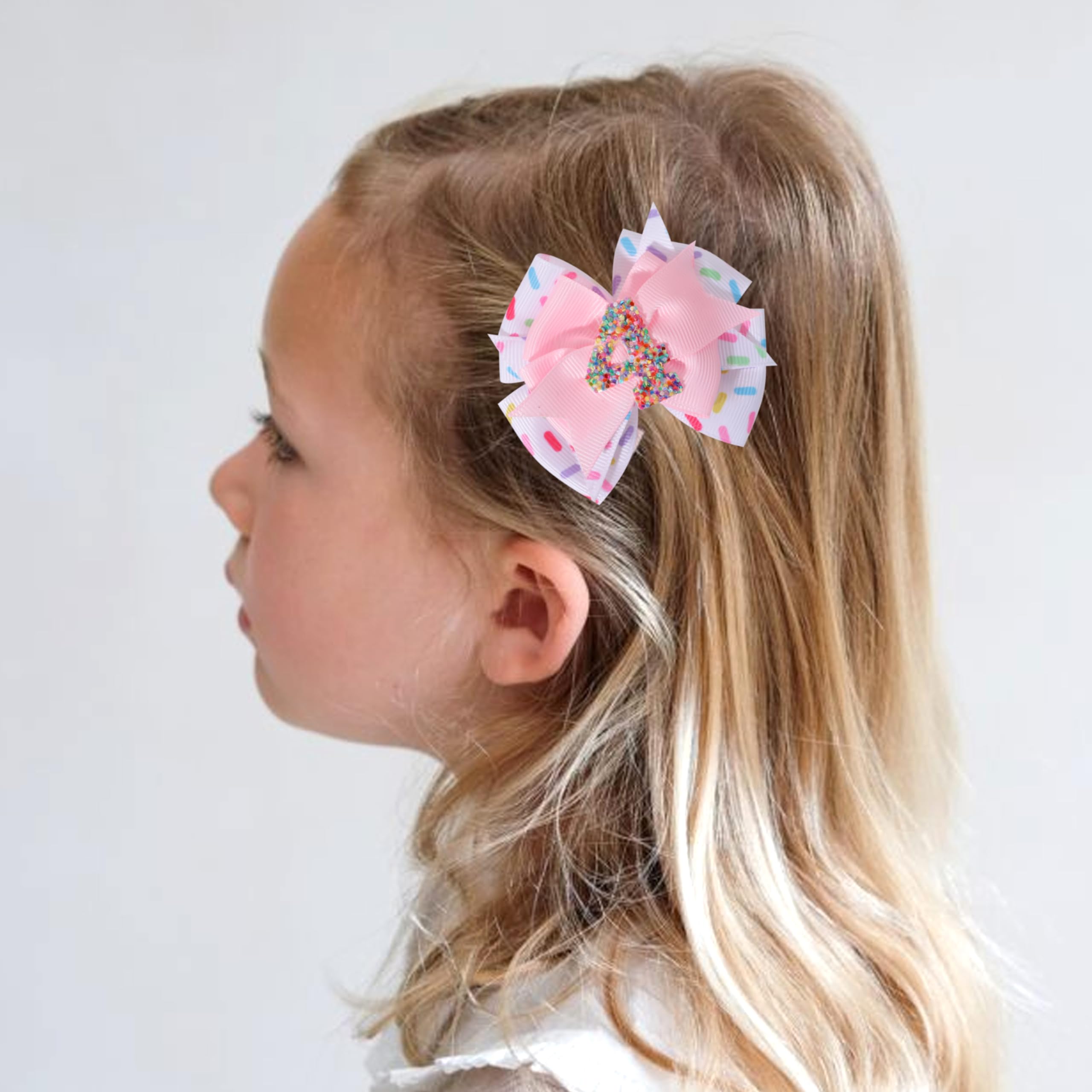 Jissoo 4th birthday hair bow with shiny number charm