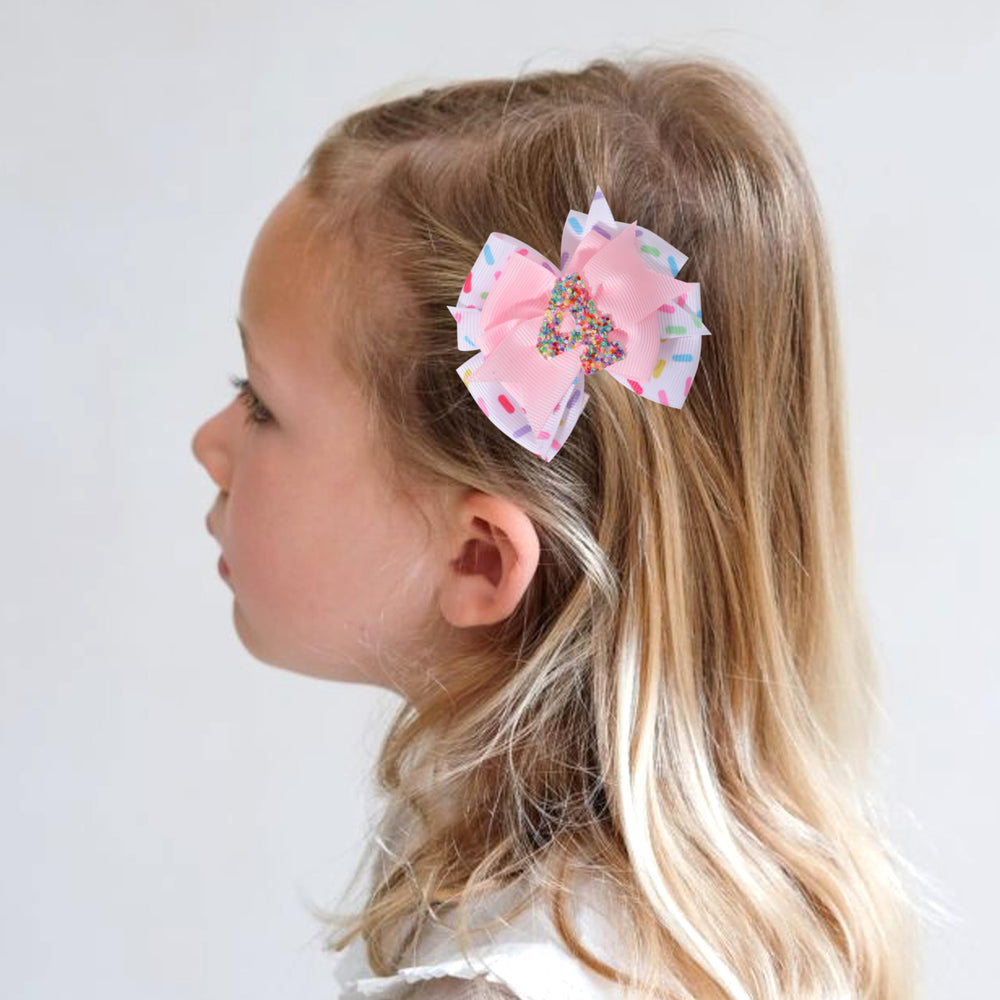 Jissoo 4th birthday hair bow with shiny number charm