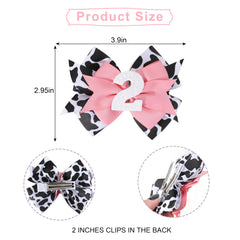 Jissoo cow print bow headband pink on baby for cute portraits