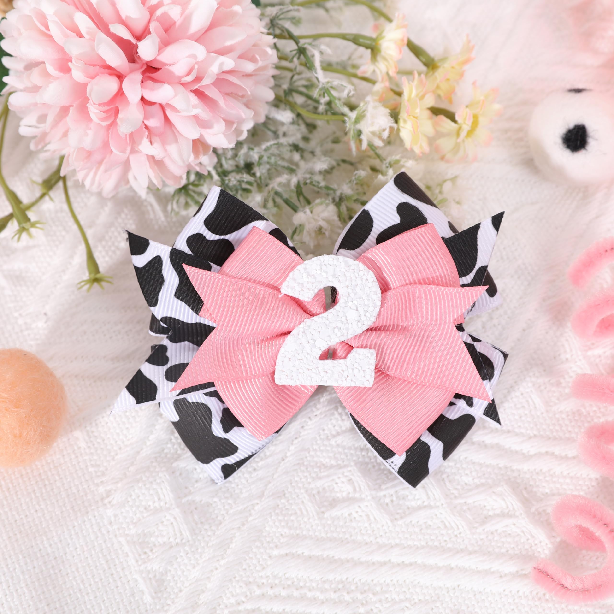 Jissoo cow print bow headband pink ideal for birthday shoots