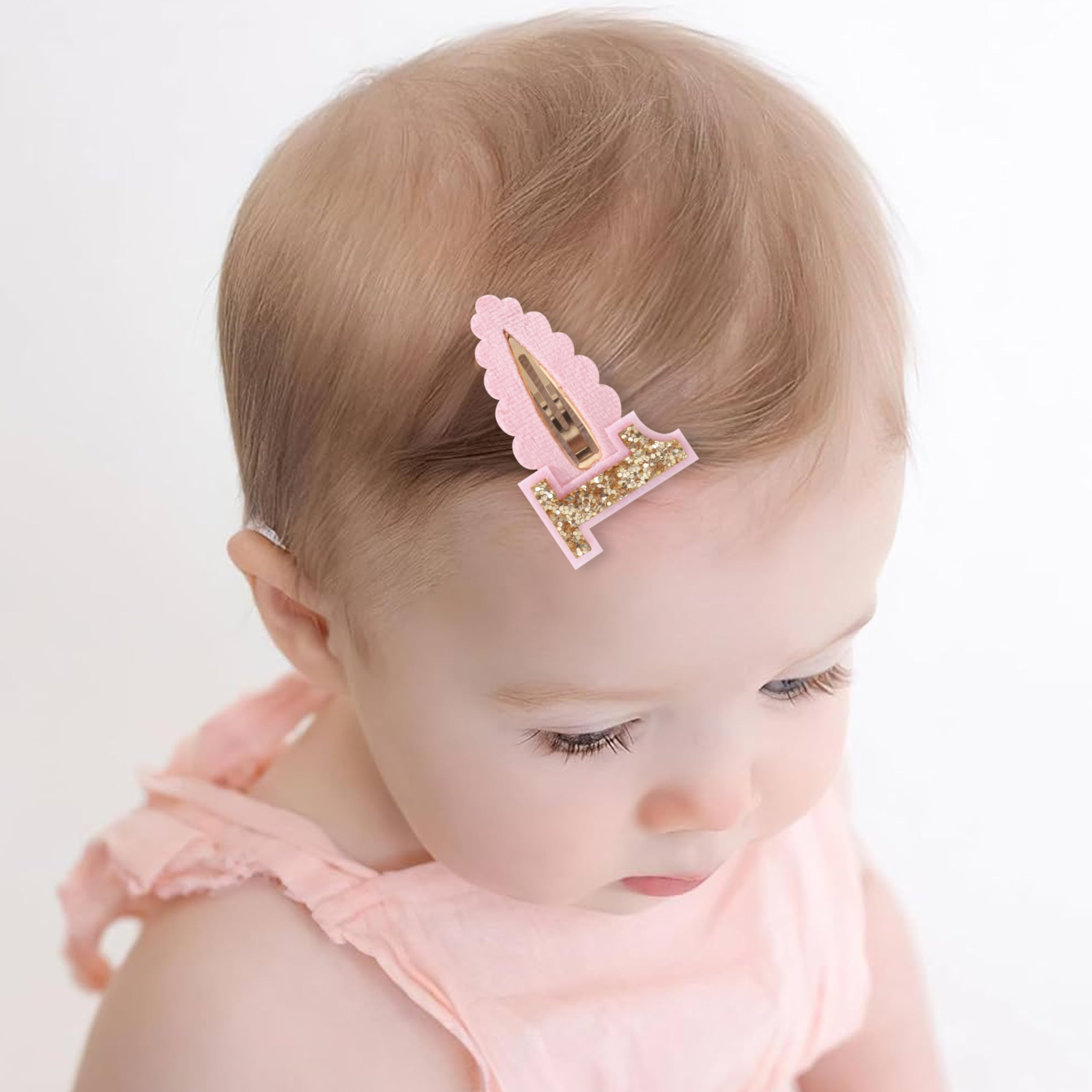 Jissoo pink hair clip with plush fabric for added charm.