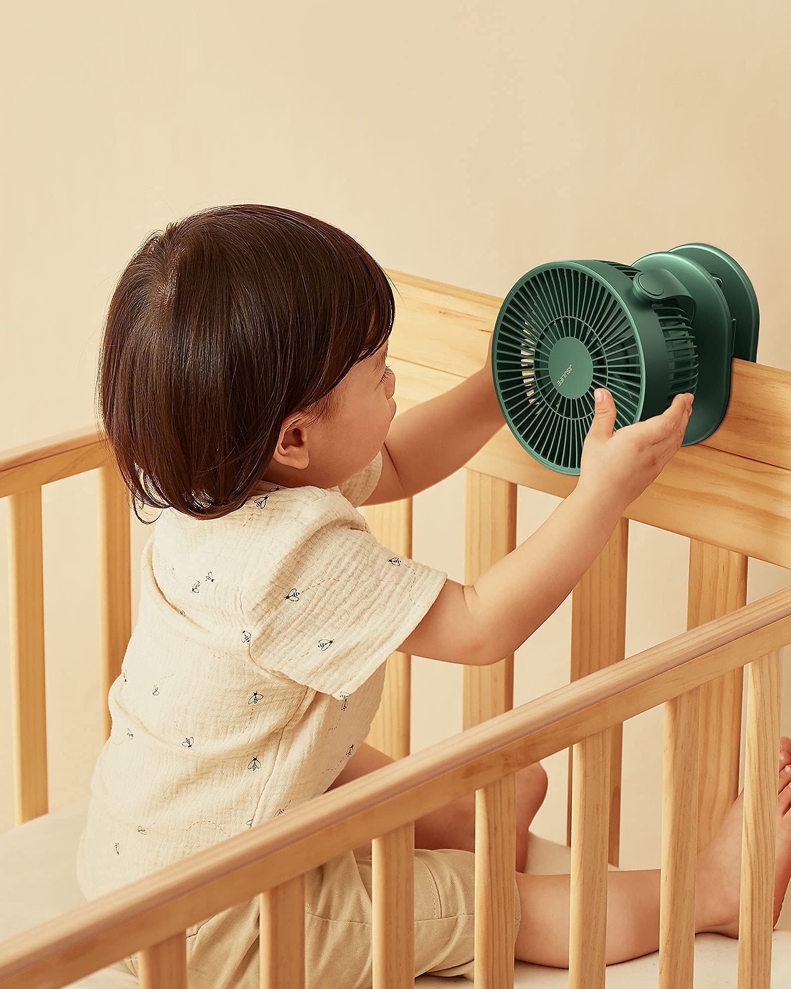 JISULIFE compact clip-on fan attaches securely to car seat or desk.