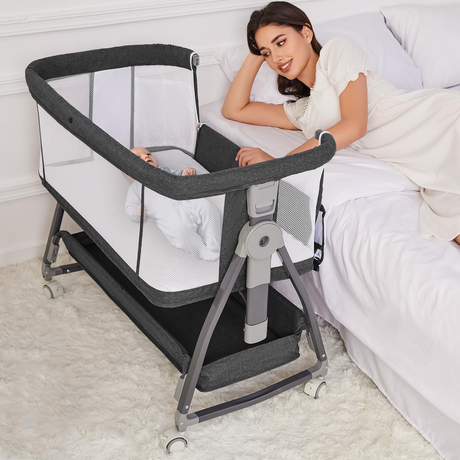 Jixrolyn Bedside Bassinet with wheels for easy room-to-room repositioning.