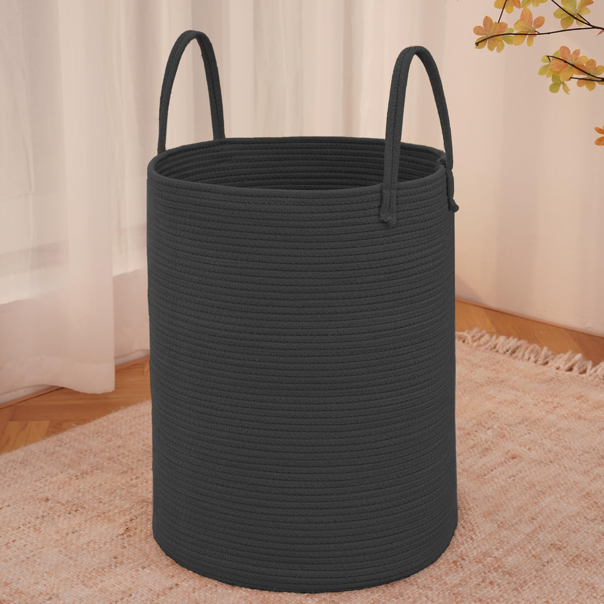 JMvicyroam large woven laundry basket front view with sturdy handles for easy transport.