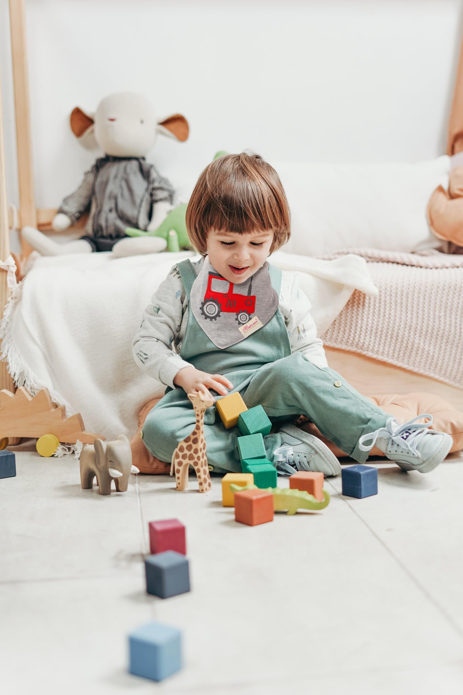 Comfortable fit JN&LULU bibs reduce fuss during drool days