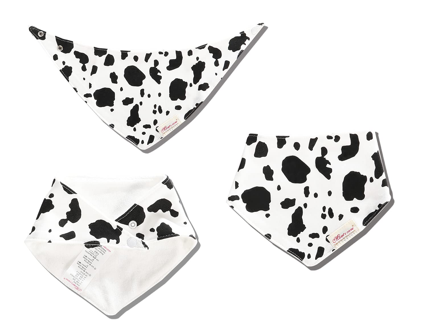 JN&LULU bandana bib cow-pattern closeup highlights soft cotton and secure snaps