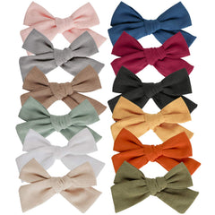 JoCoDesigns baby girl bow clip beige color, secure alligator clip for all hair types.