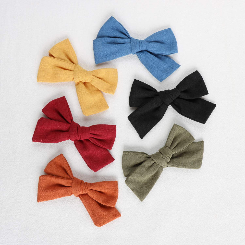 JoCoDesigns baby girl bow clip olive color, perfect for tousled hairstyles.