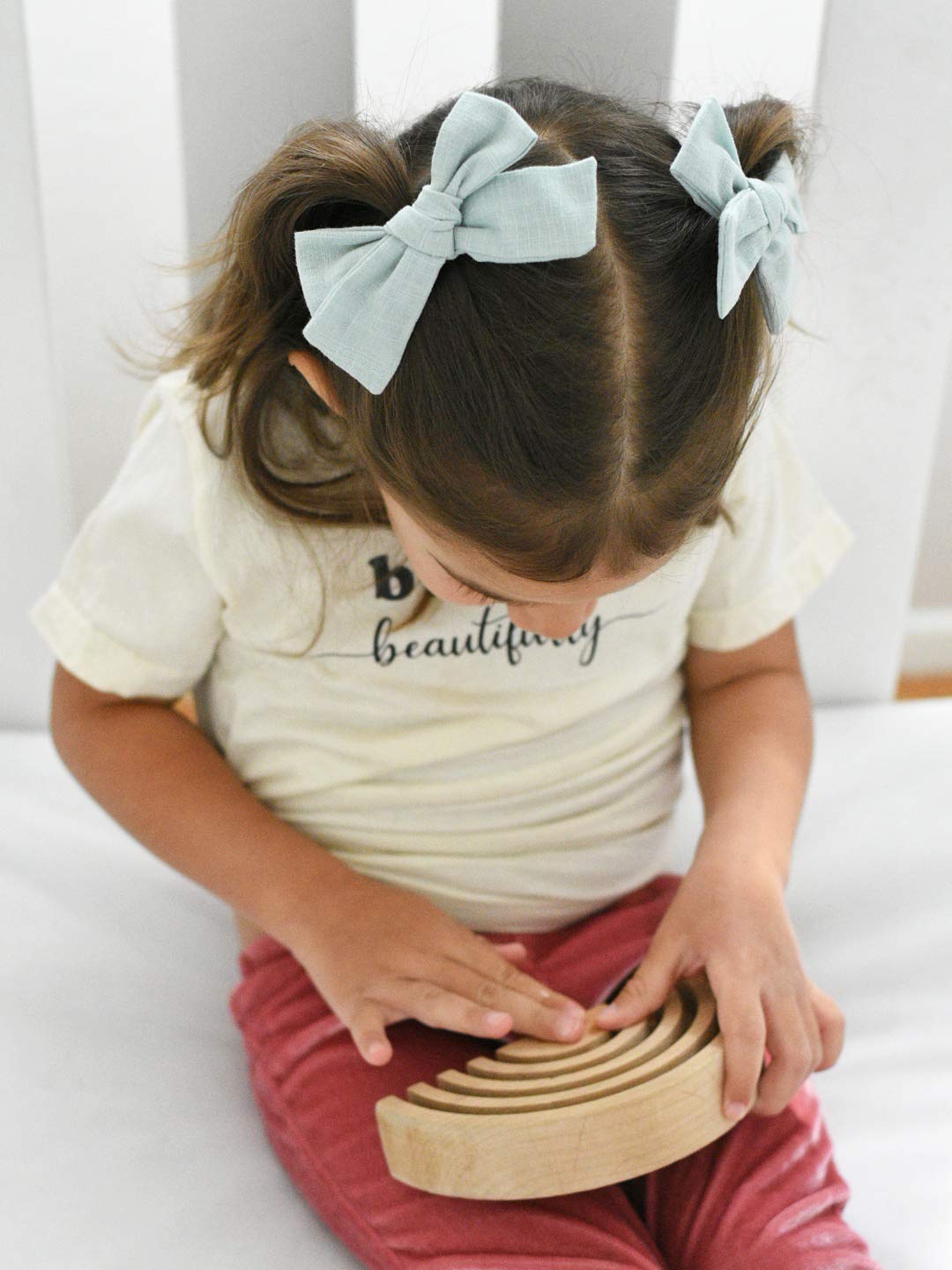 JoCoDesigns baby girl bow clip wine color, secure grip for active days.