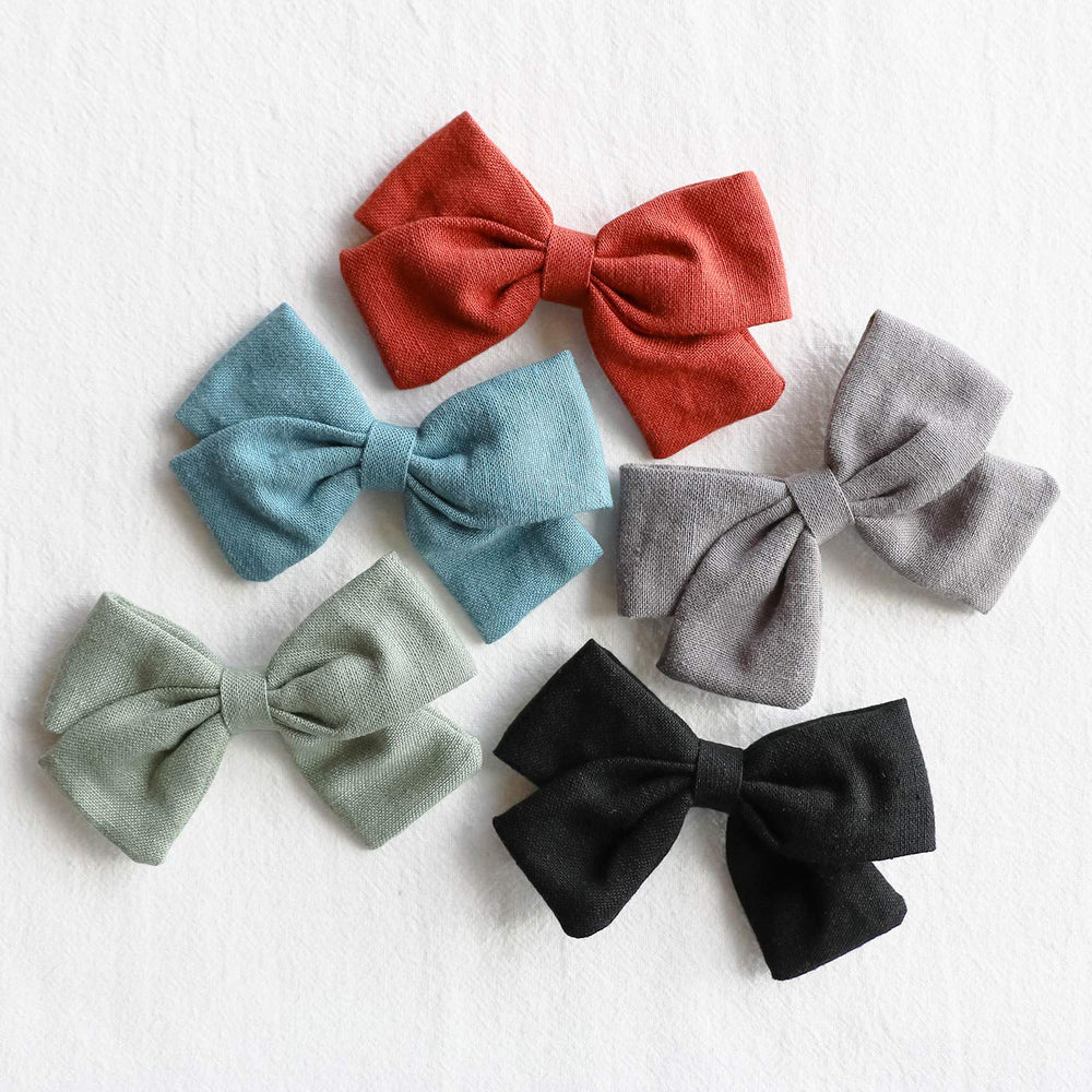 JoCoDesigns baby girl hair accessory on toddler demonstrating wearability and comfort.