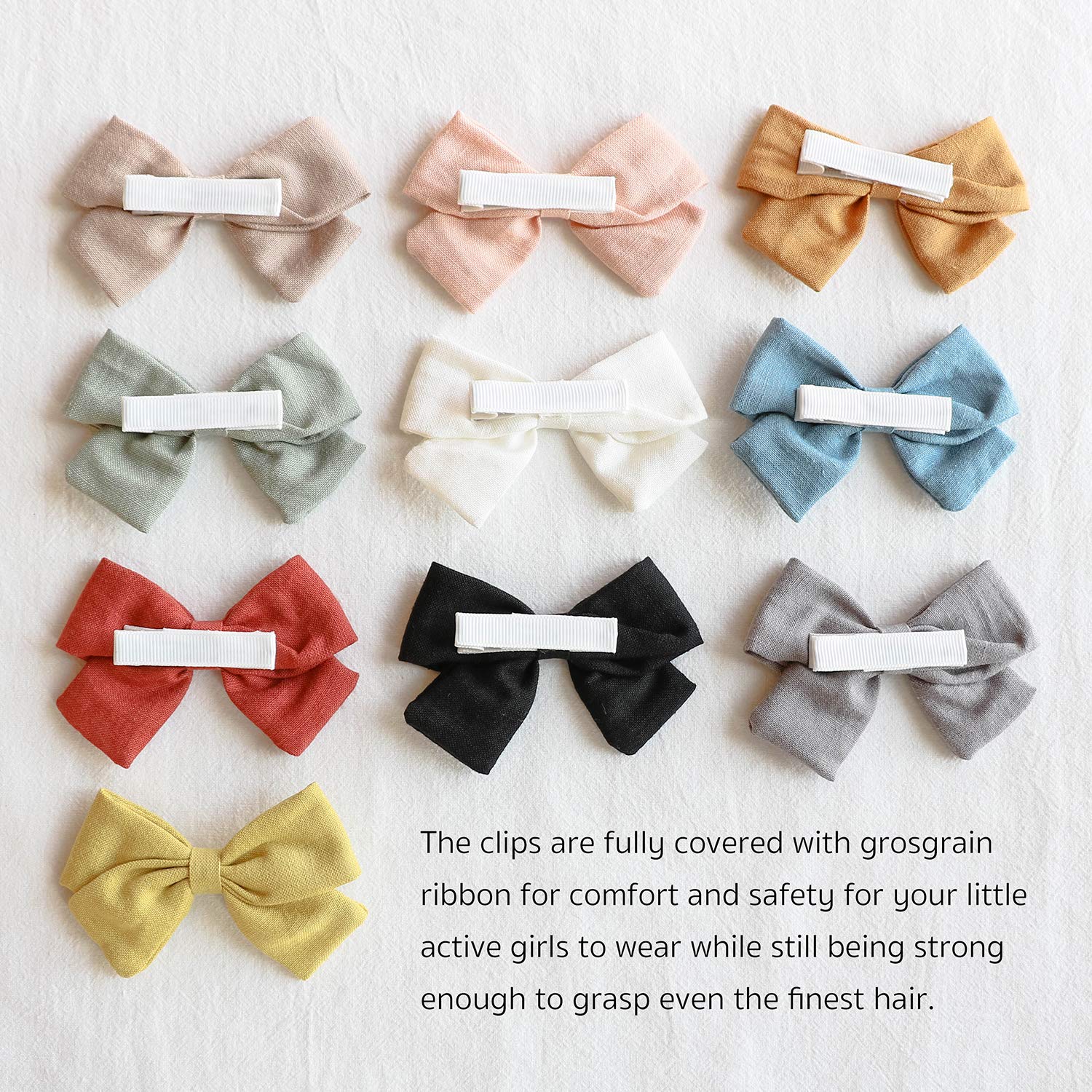 JoCoDesigns fully lined alligator clip detail with ivory ribbon edge for gentle grip.
