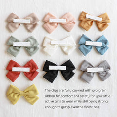 JoCoDesigns fully lined alligator clip detail with ivory ribbon edge for gentle grip.
