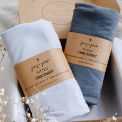 Joey + Joan light grey fitted crib sheet hugs 52x28 mattress for snug sleep