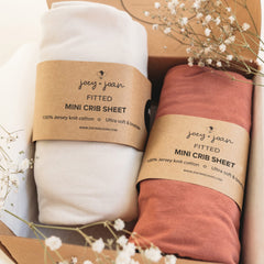 Joey + Joan mini crib sheet packaging showing premium presentation and gift-ready packaging