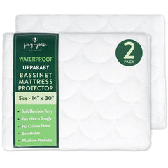 Joey + Joan waterproof bassinet pad cover fits UPPAbaby bassinets, protecting against spills.