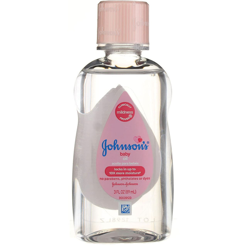Close-up of Johnson & Johnson Baby Oil bottle showing smooth oil texture.