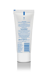 Johnson's Baby Cream on the elbow area providing lasting moisture.