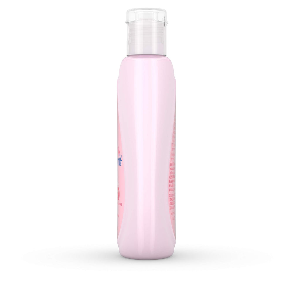 Johnson's Baby Lotion on bathroom shelf signals everyday baby skincare routine.