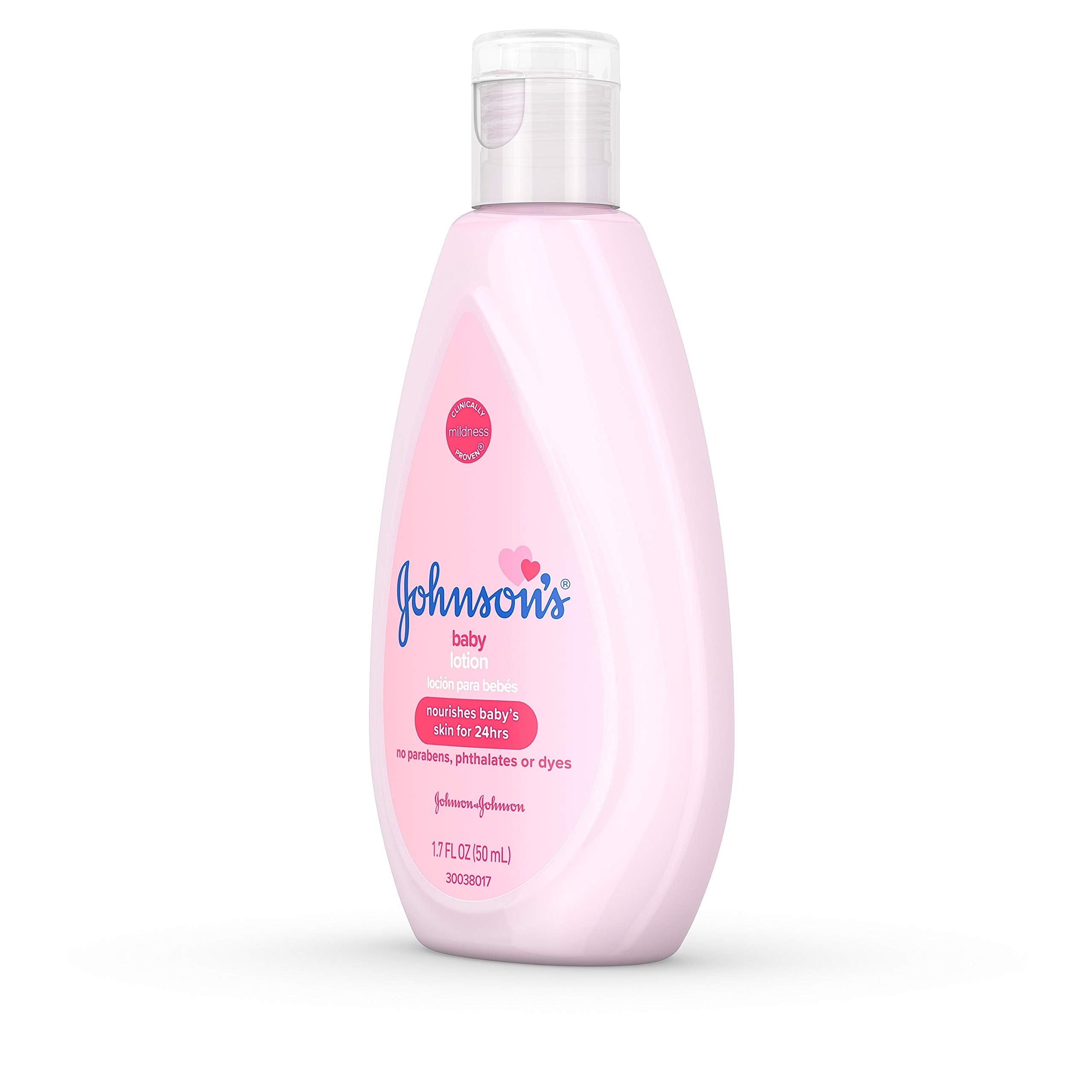 Johnson's Baby Lotion travel-size bottle held in hand for on-the-go care.