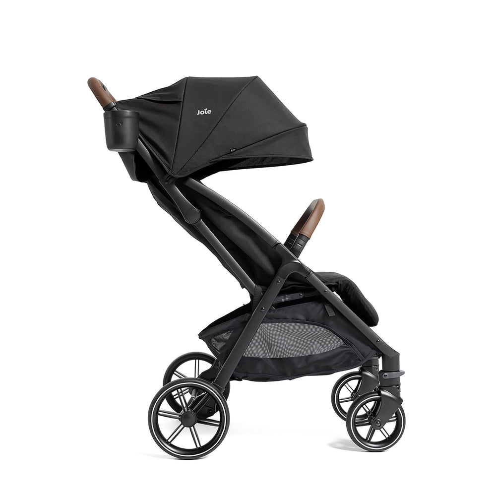 Joie Nutmeg with UPF 50+ canopy shading bright outdoor days.