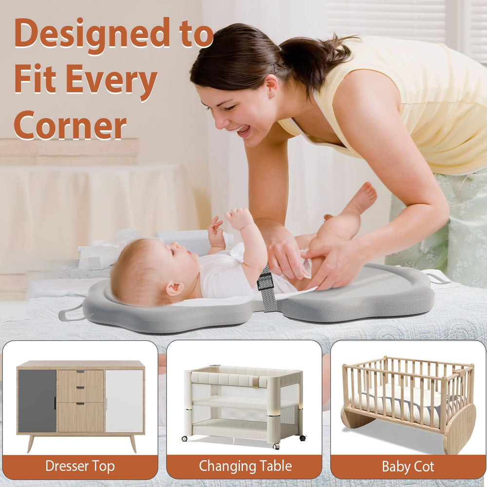 Jolensoy baby changing pad raised edges add security for wiggly babies.