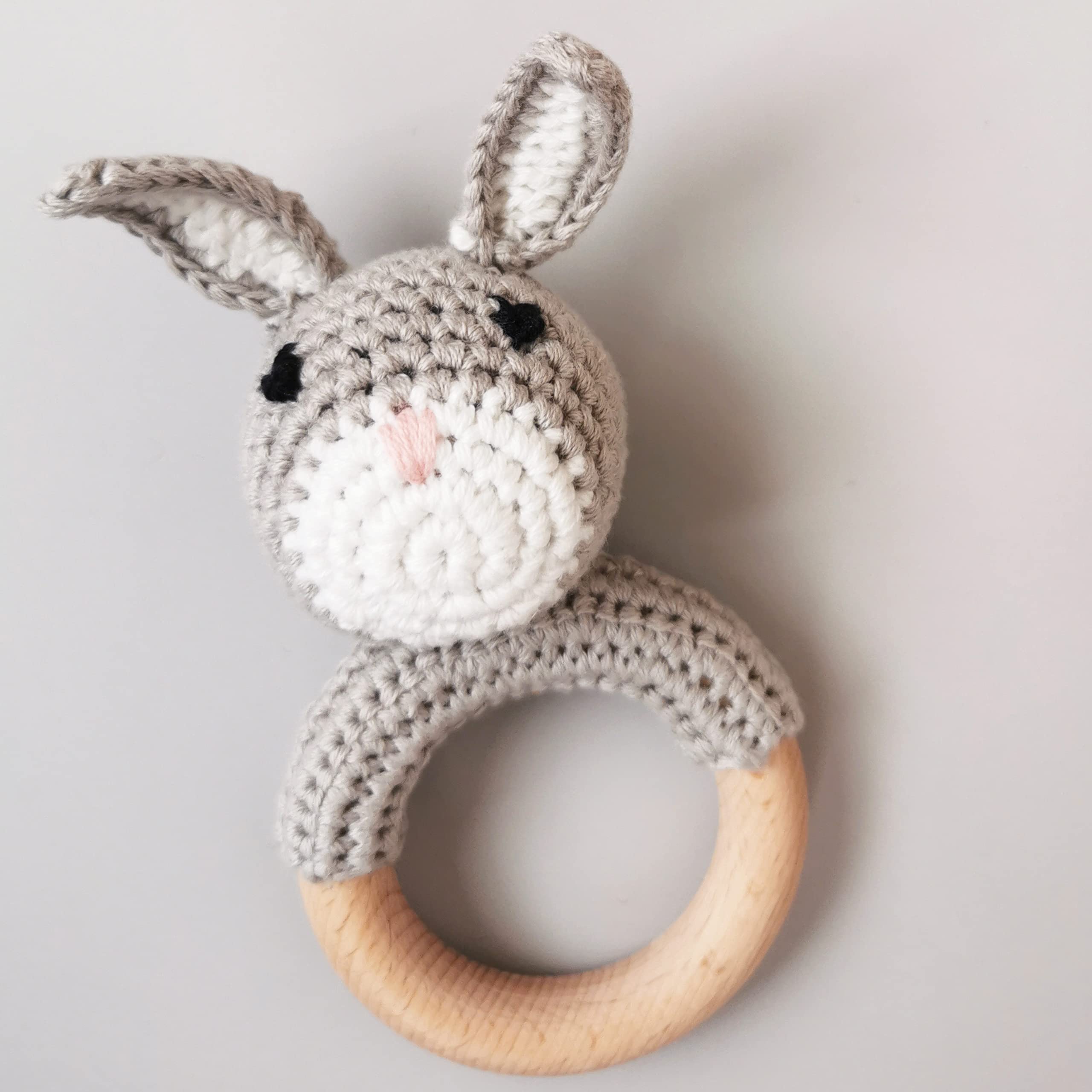 Joliecraft Beech-Wood Teether Ring provides a smooth, safe teething grip.